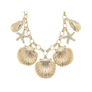 White Crystal Gold Tone Seashell Charm Necklace