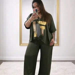 LaYaiBoutique #2396 Women's olive green pantsuit, elegant and modern.  Includes a loose-fitting blouse with gold details and wide-leg pants, perfect for a sophisticated yet comfortable look.