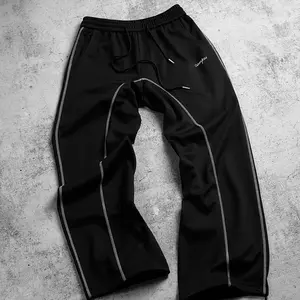 Men’s embroidered black casual athletic track pants—stylish, bold, versatile—with a drawstring elastic waistband, ankle length, stretchy, flowy, breathable, soft, lightweight, durable fabric made from polyester–spandex. Straight-leg and jogger 2‑in‑1 styl