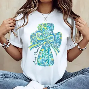 Lightweight Cotton Casual Round Neck Short Sleeve Summer T Shirt Featuring Vibrant Cross and Bow Design With He Is Risen Graphic Perfect for Outdoor Activities Machine Washable Not Suitable for Dry Cleaning Made in the USA