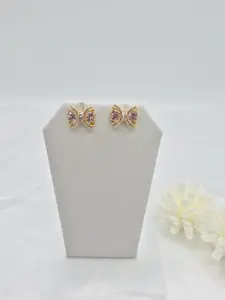 Pink bow earring in 14k gold plated. (101) Pink bow earring in 14k gold plated. (101)