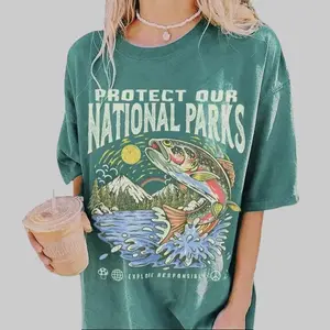 National Parks Fish T-Shirt on a Comfort Colors tee, perfect nature lover gift, stylish camper and hiking shirt with trendy granola girl vibes.