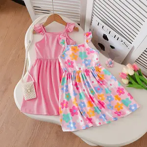 The most adorable double set is here! A girls' two-piece dress set - a stylish pink frilled puff-sleeved knitted dress paired with a cute pink floral print short skirt. Suitable for children aged 4-7 in the US, it is a must-have fashion item for summer.