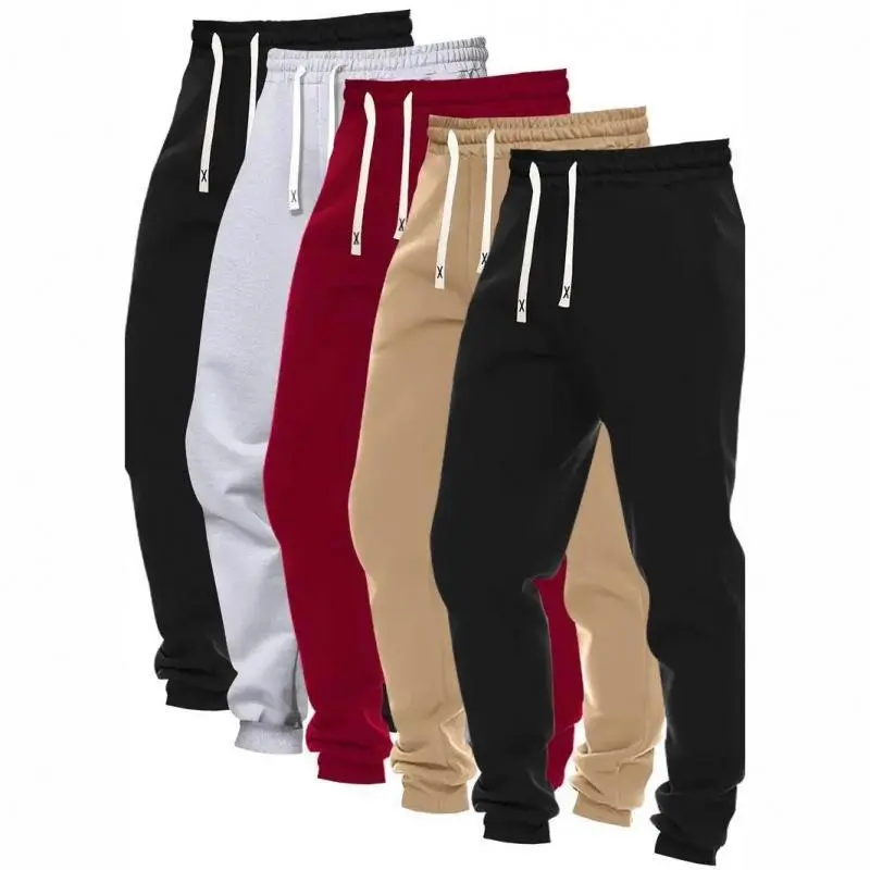 5-piece set of men's solid color sports pants, made of polyester knitted fabric, with a regular fit, drawstring waist circumference, and a casual sports jogging pants with pockets, with slight elasticity.