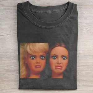 Funny Barbie Doll Disgusted Reaction T Shirt, Shocked Face Meme Graphic Tee, Vintage Weirdcore Shirt, Internet Humor Streetwear, Washed Black Unisex T Shirt, Y2K Meme Top