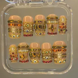 Golden Stacked Rings Press-On Nails Square Shape Nude Pink Base Layered Gold Band Details Crystal Stud Accents Vintage Jewelry Vibe Handmade Luxury Statement Nail Set