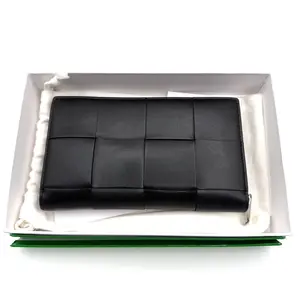 Pre-owned Bottega Veneta Leather Clutches & Wristlets Cassette Zip Around long wallet in black leather