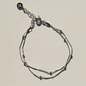 Silver Double Layer Saturn Chain Bracelet