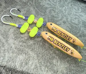 Mr. Bentley Rigs 2 Pack (11cm):  Tied on 6/0 white glow hooks, glow in the dark smiley beads, and 100 pound yellow mono leader lines