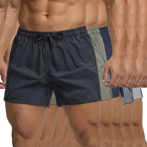 Men’s athletic casual shorts—the gym favorite—solid color, breathable, quick-drying, featuring zippered pockets and a drawstring waist, suitable for outdoor activities and fitness training. Men's Shorts summer fit Solid Zipper