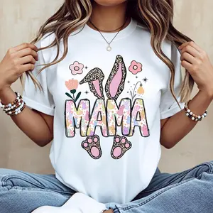 Women’s Cotton Mama Bunny Easter T-shirt - summer casual graphic tee with a round neck, short sleeves, regular fit, loose fit, leopard ears and paw prints, pink flower design; machine washable, not dry clean; made in USA