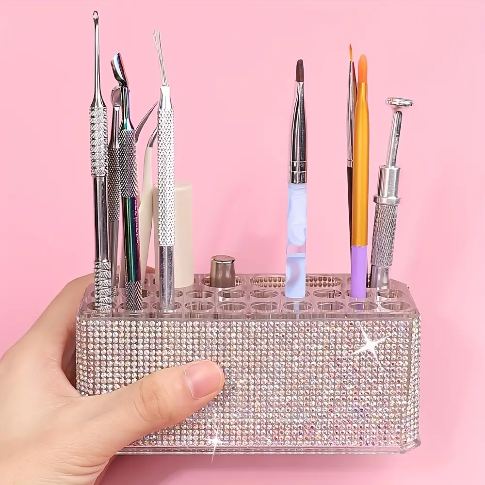 A minimalist and stylish 26-hole diamond-studded luxury acrylic makeup brush holder—perfect for storing nail brushes, nail pens, and some tools. Multifunctional Organizer Boxes