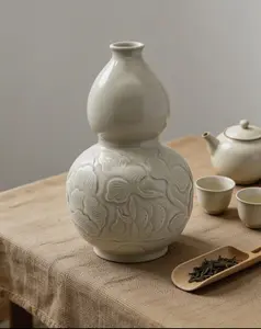Chinese  white-glazed carved gourd bottle