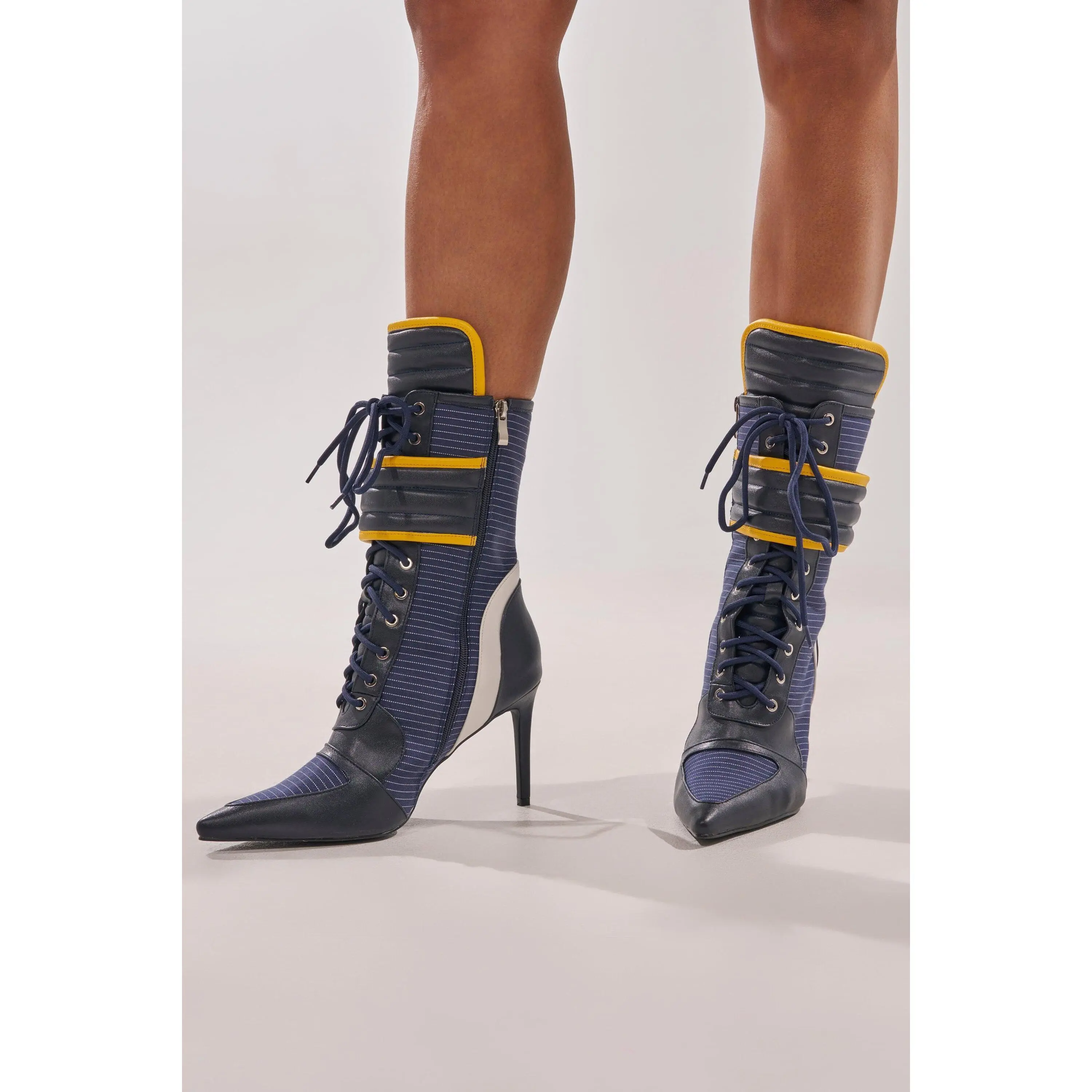 AKIRA GOLD DEMAND NAVY STILETTO BOOTIE