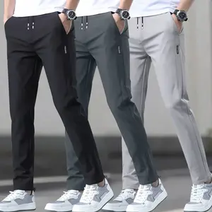 Men's 3-pack slim fit straight leg casual pants, polyester spandex blend, featuring an elastic waistband with drawstring, mid-rise, side pockets, suitable for outdoor activities and everyday