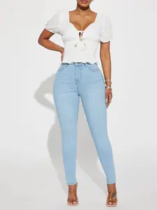 Alaia High Rise Stretch Skinny Jeans - Light Wash