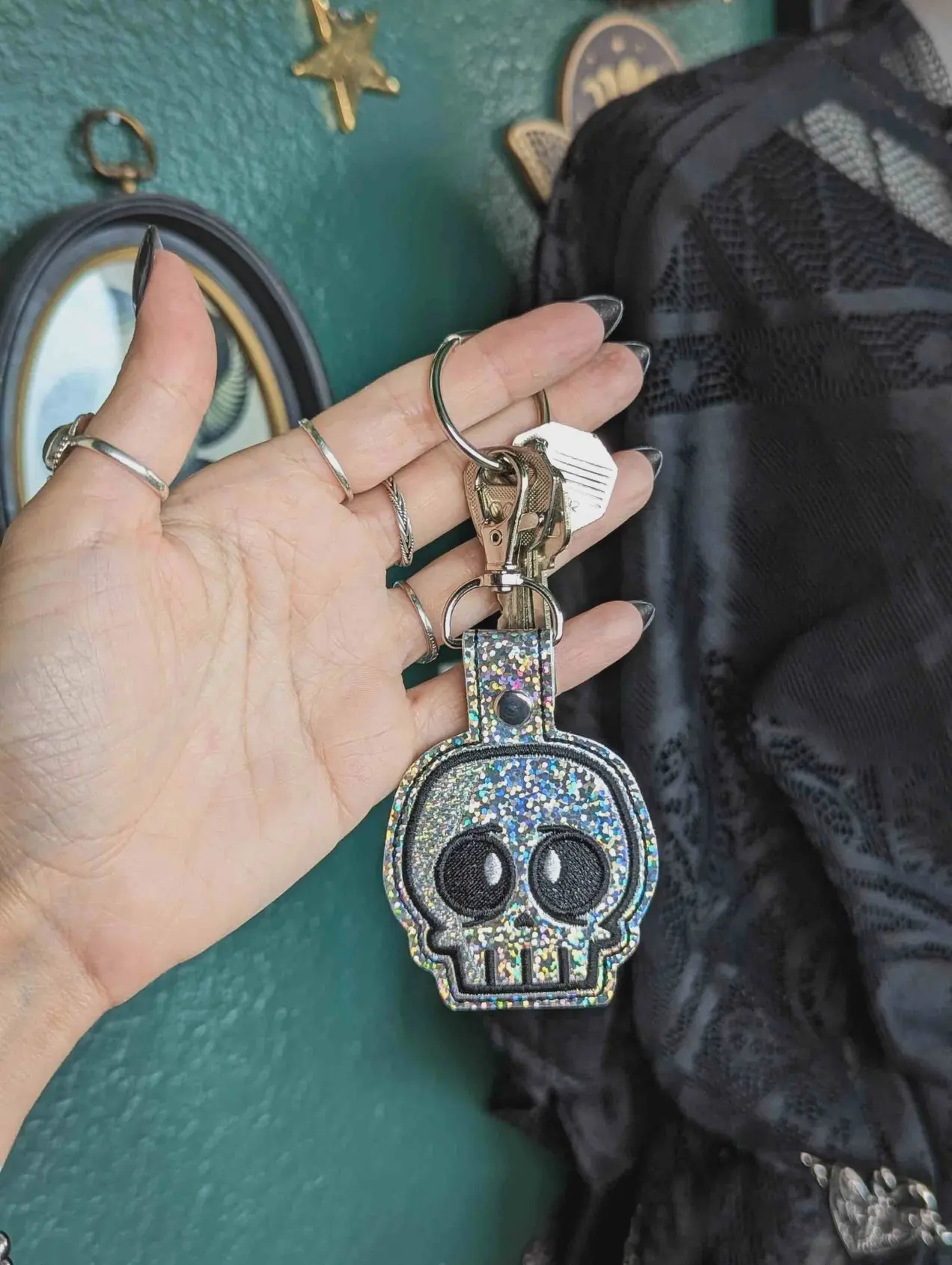Silver Glitter Skull Embroidered Keychain with Holographic Vinyl, Gunmetal Hardware