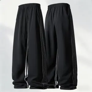 Men's new black and white striped wide-leg vertical sweatpants in spring and autumn, with drawstring to adjust the waist, wide-leg loose version, suitable for men who pursue individuality to go out on the street every day Pants