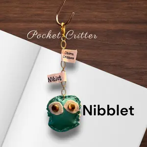 Pocket Critter Nibblet - Adorable Teal Felt Keychain with Gold Eyes and Soft Stitching for Everyday Charm