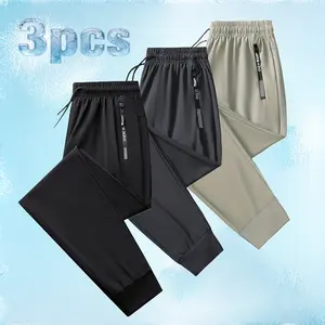Ice silk sports pants with a drawstring; casual stretch sweatpants with zippered pockets at the waist; lightweight quick-dry fitness long pants made from skin-friendly, smooth fabric—breathable athletic bottoms suitable for indoor workouts and summer outd