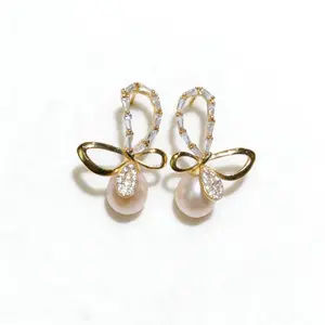 E06-S925 Bow Earrings with Natural Freshwater Pearls Teardrop Rice Shape Pale Pink Light Champagne Color Pearls Bow Stud Earrings Daily Jewelry for Girls Wedding Birthday Gifts