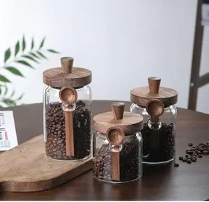 Creative Little Bee 3-Piece Coffee Bean Storage Jar Set Modern Nordic Design Eco-Friendly Glass Containers with Wooden Lids & Spoons for Fresh Coffee Bean Storage Kitchen Tin candy jar candy jar