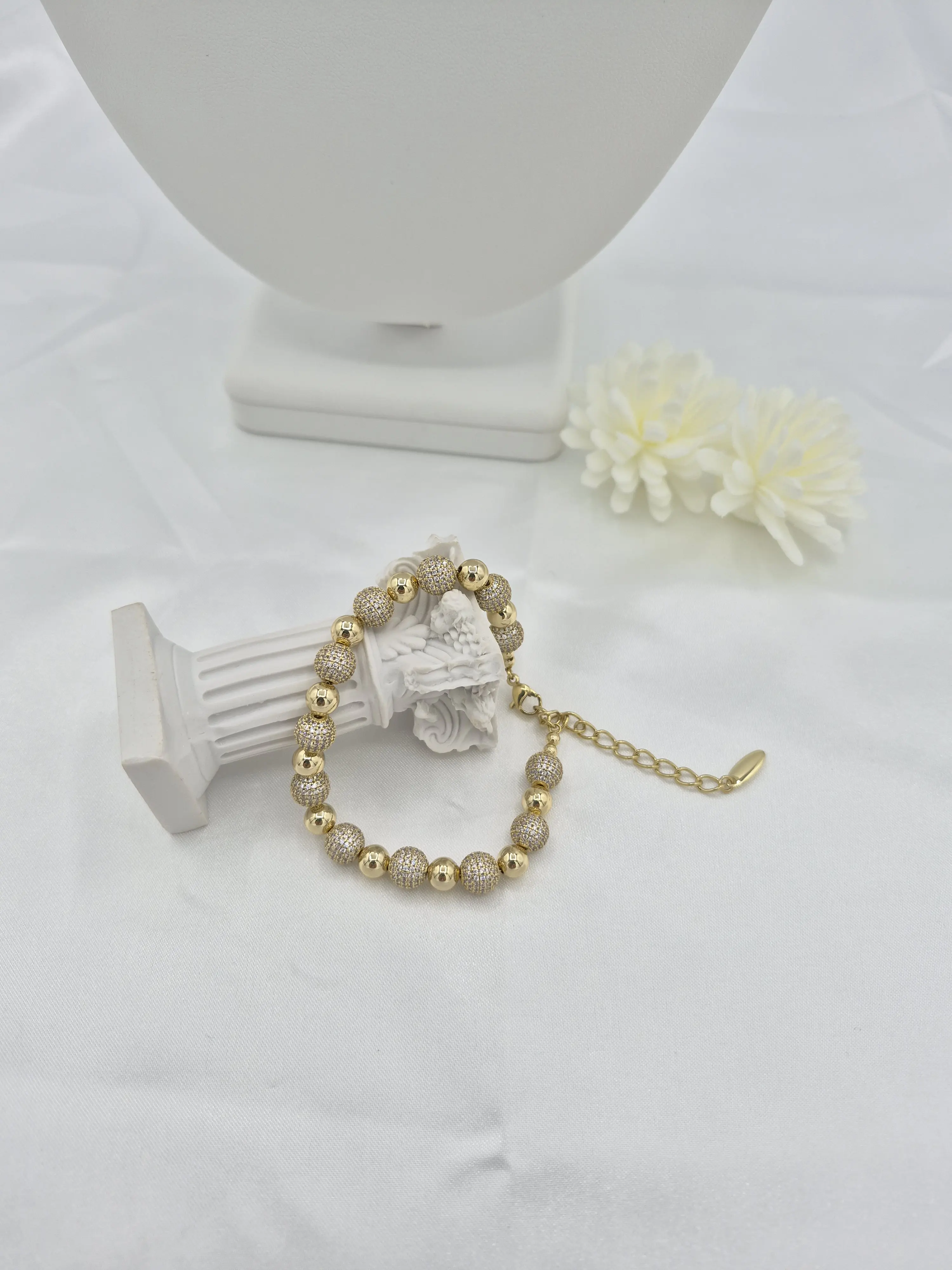 14k gold plated beaded bracelet with zirconia. (97)