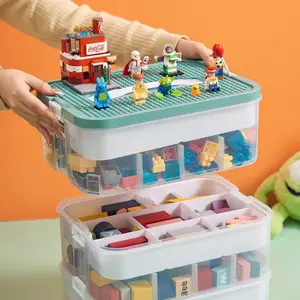 UFORU Kids' Building Block Storage Box. 3-layer stackable transparent plastic box with lid and adjustable dividers. Perfect for storing blocks and small toys at home or in playrooms. Made of clear plastic for neat organization.