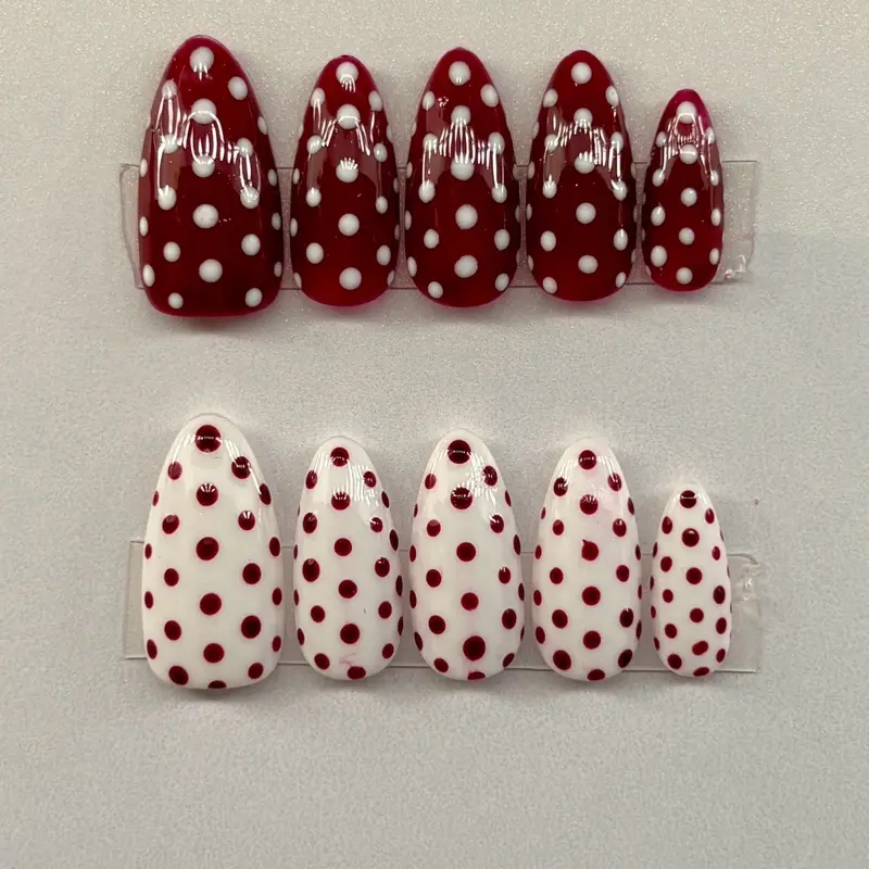 Red and white polka dot nails