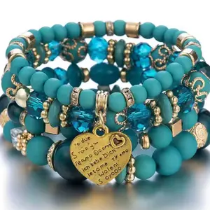 The Teal Serenity Stack Bohemian-Inspired Bracelet Set with Gold Accents Comfort Stretch Fit for Everyday Wear and Casual Chic