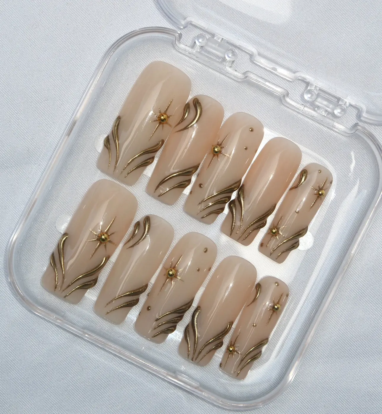 Esme Press-On Nails by Pretty Set Studios - Long Square Nude & Gold Nail Decoration with Gold Chrome 3D Designs, Handcrafted Art, Eco-Friendly, Vegan & Cruel-Free, Reusable Sets, Wear 4 Weeks, Salon-Ready, Vegan & Cruelty Free, Glamorous, Elongated