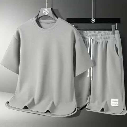 Men’s casual athletic set for summer: loose, breathable, quick dry design featuring a crew neck long sleeve T shirt and drawstring shorts; men’s waffle set suitable for weekend leisure.