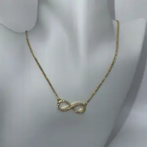 Necklace Infinit - Elegant Gold-Tone Infinity Pendant with Delicate Chain for Everyday Wear