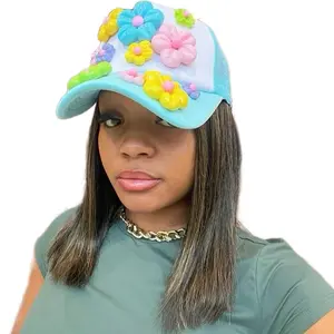 PASTEL BLOSSOM TRUCKER HAT