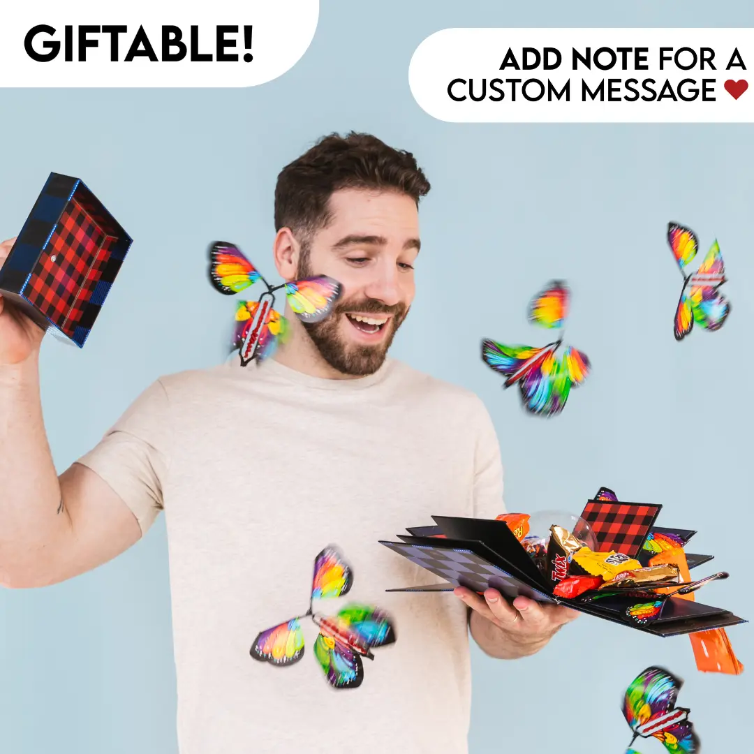Father's Day Gift Bundle By Send A Cake - A great gift for Dad! A sleek blue & black gifting box, includes a chocolate chip bundt cake, flying butterflies, & chocolate candy bars! An impressive birthday, anniversary, congrats, or just because gift!