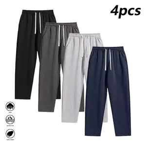 Men’s 100% polyester loose-fit athletic pants, available in light gray, gray, black, and blue — drawstring elastic waistband, wide cut, casual everyday wear, spring style