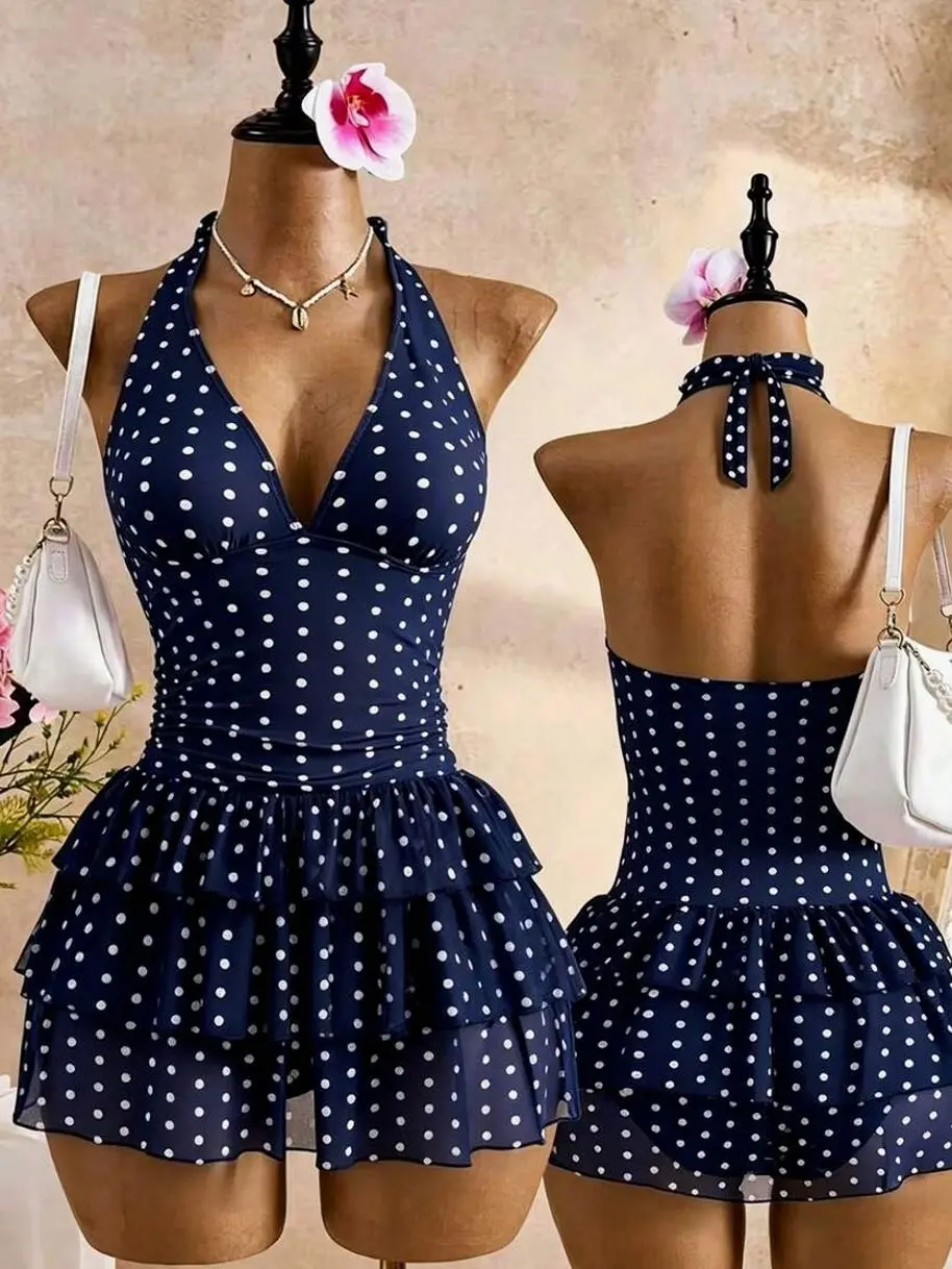 Bellisia Navy Blue Polka Dot Halter Swim Dress | Deep V Backless Ruched Tummy Control Swimsuit | 3-Tier Ruffle Hem Retro Pin-Up Bathing Suit