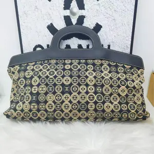 Pre-owned CHANEL Canvas Clutches & Wristlets Brown Printed Tote Bag