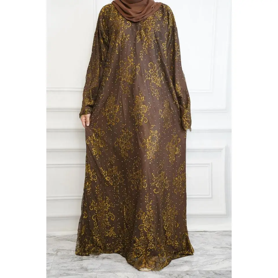 Nadra floral lace closed abaya Simple, beautiful, and easy to wear. This closed abaya features delicate floral lace details and a flowing design that makes it perfect for any occasion. Includes a matching hijab and comes in a variety of colors.