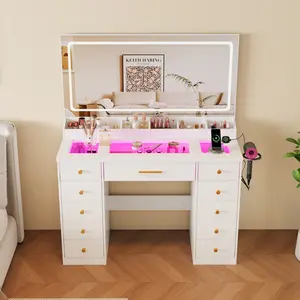 Vanity set includes a large LED mirror and glass-top dressing table with RGB ambient lighting, 11 drawers and 6 desktop storage compartments, power outlet Charging Station , and 3 adjustable lighting modes.  Modern white bedroom Makeup vanity