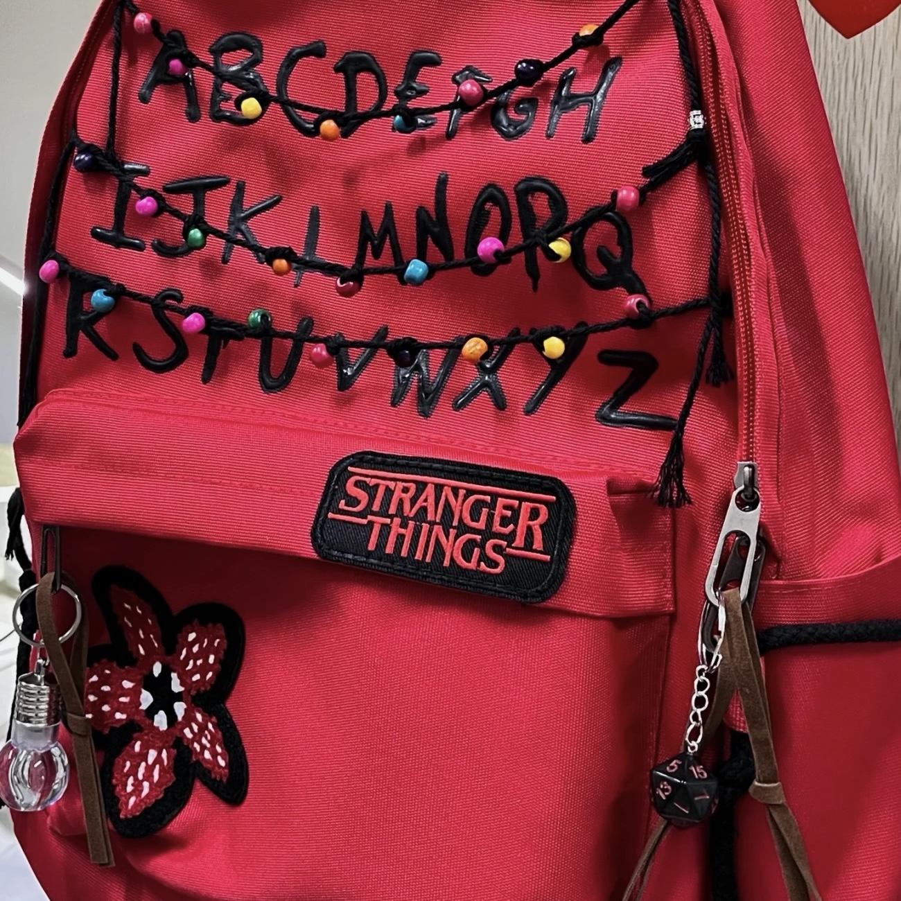 Stranger Things Backpack Shopping Bag Travel Bag Schoolbag Student WorkStudy Backpack Large Capacity Simple Design Red and Black Flower Pattern.