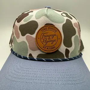 Fairways and Flyways One birdie at a time Leather Patch on a camo/blue rope hat. Golf Rope Hat