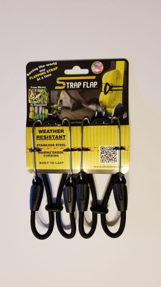 StrapFlap - Perfect solution for keeping your straps.cords and hoses tied and secure. Weather Resistant Stainless Steel Hook & Marine Grade Shock Cord for long life. Made in the USA StrapFlap - Perfect solution for keeping your straps.cords and hoses tied and secure. Weather Resistant Stainless Steel Hook & Marine Grade Shock Cord for long life. Made in the USA