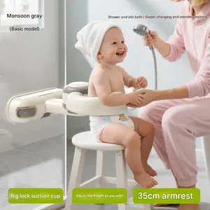 Baby standing bath aid, infant bottom washing support, handrail to prevent falls.
