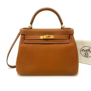 Pre-owned HERMÈS TOGO Top Handle Bags Kelly 28 Retourné in brown Leather with Gold Hardware (A Stamp)