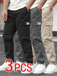 Men’s 3-pack casual pants with multiple pockets, an elastic waistband, and a drawstring design; comfortable for all seasons and durable fabric for everyday wear. Suitable for business/office, outdoor sports, and family gatherings.