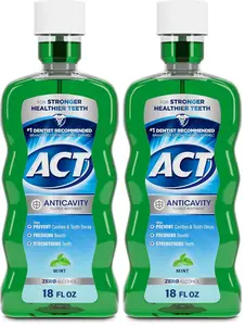 ACT Anticavity Zero Alcohol Fluoride Mouthwash | Mint Flavor | 18 fl. oz. | Pack of 2 | Includes Dosing Cup
