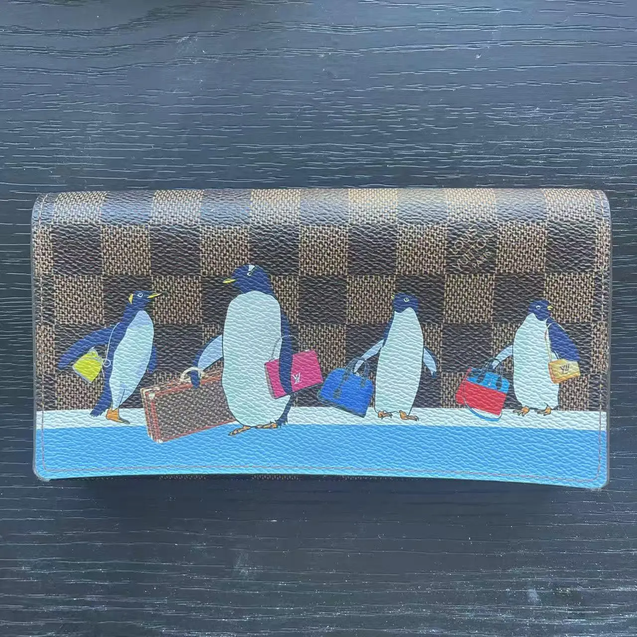 Pre-owned Louis Vuitton leather Clutches & Wristlets Clemence Penguins Long Wallet, Gold Mini Bag Accessory, Ideal Gift for Bag Enthusiasts