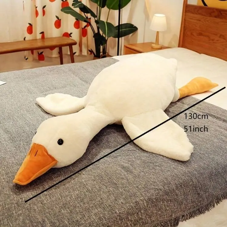 birthday gift ideaCute Big White Goose Plush Pillow Toy! Large and irresistibly huggable, it's a favorite for both kids and adults. Suitable for all beds, offering coziness whether you cuddle or clamp it. A practical and sweet sleep companion. tiktokshops