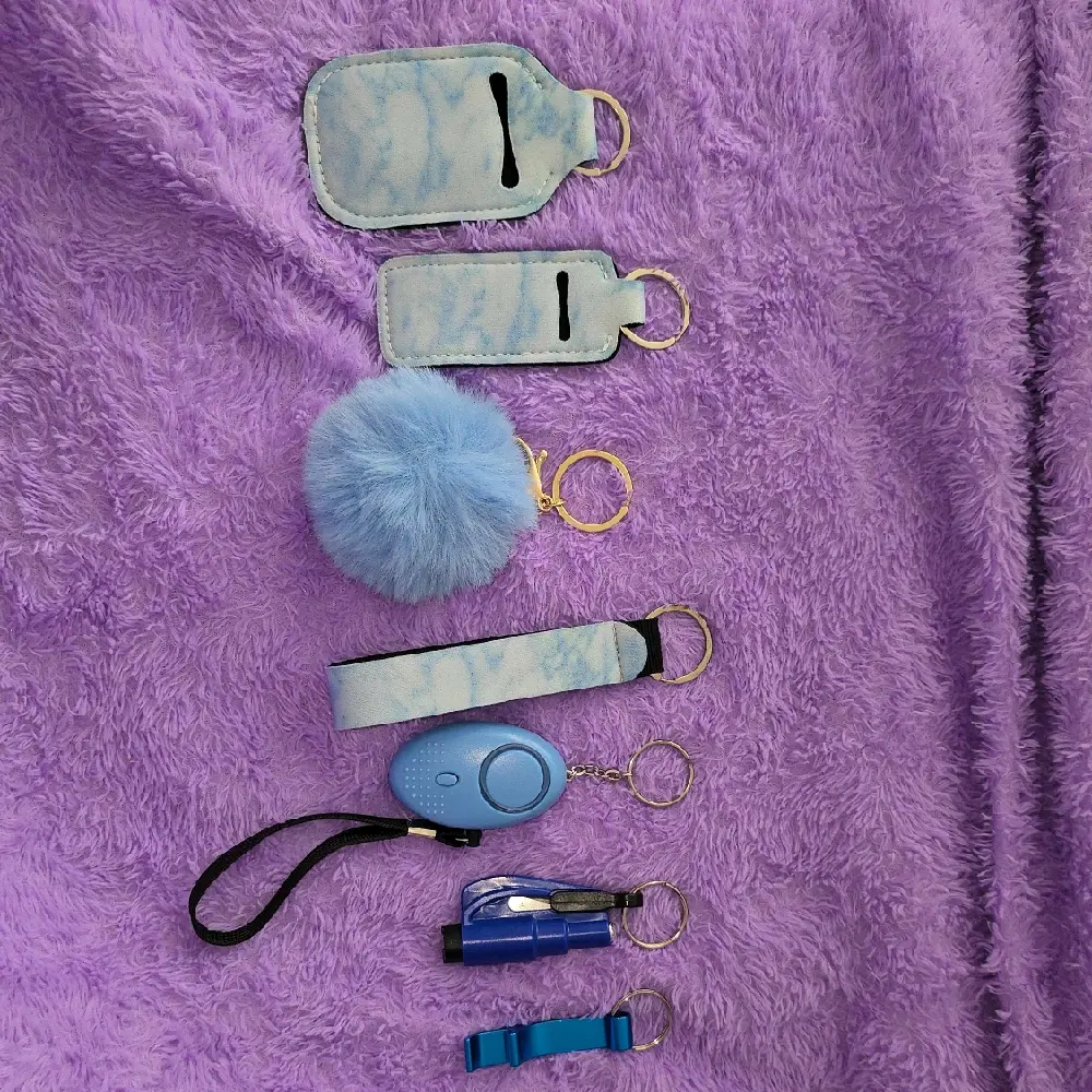 Keychain Set with Alarm, Lip Gloss Holder, Lotion Bottle, and More.
